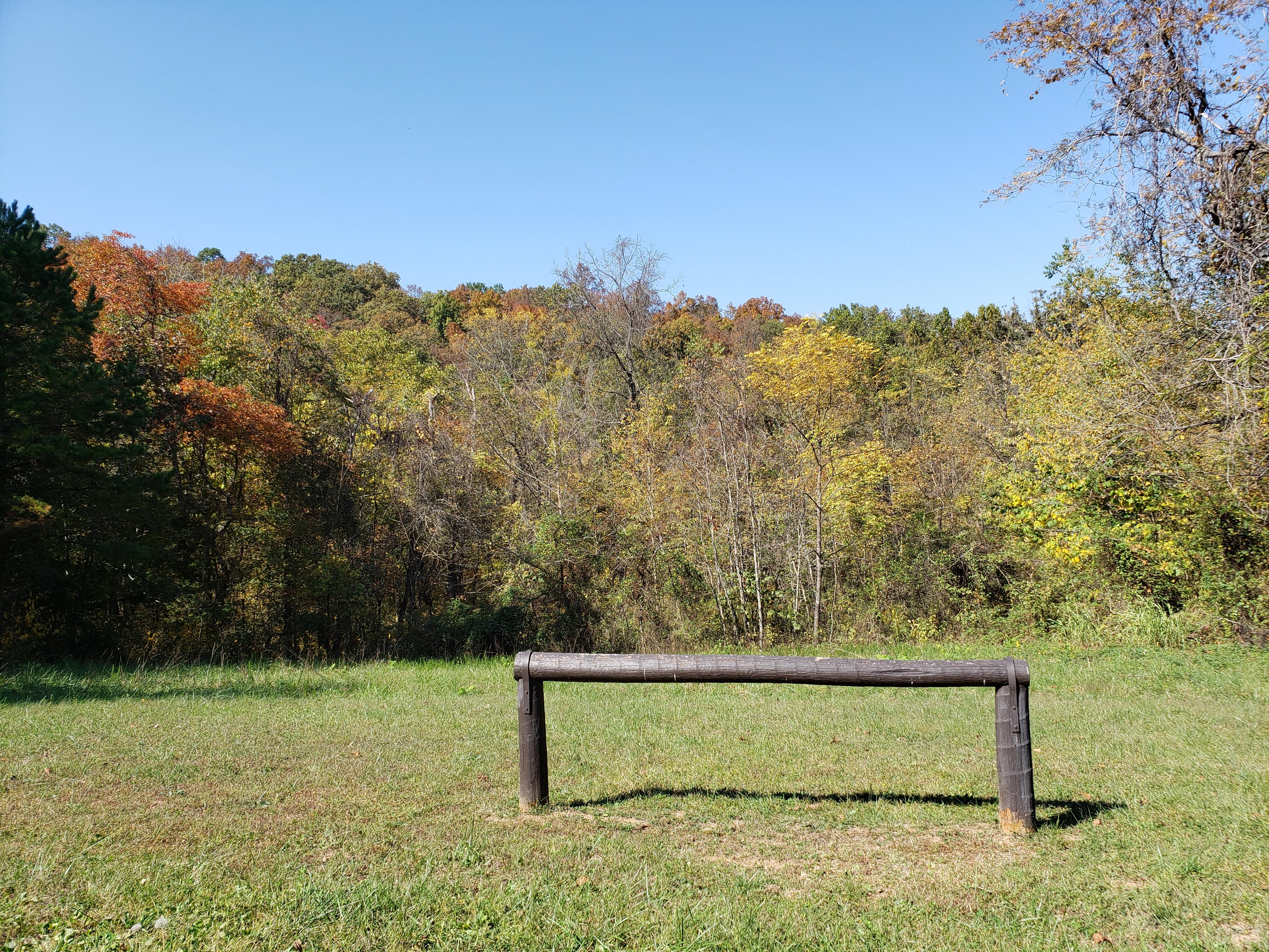 A wooden beam for staging horses.