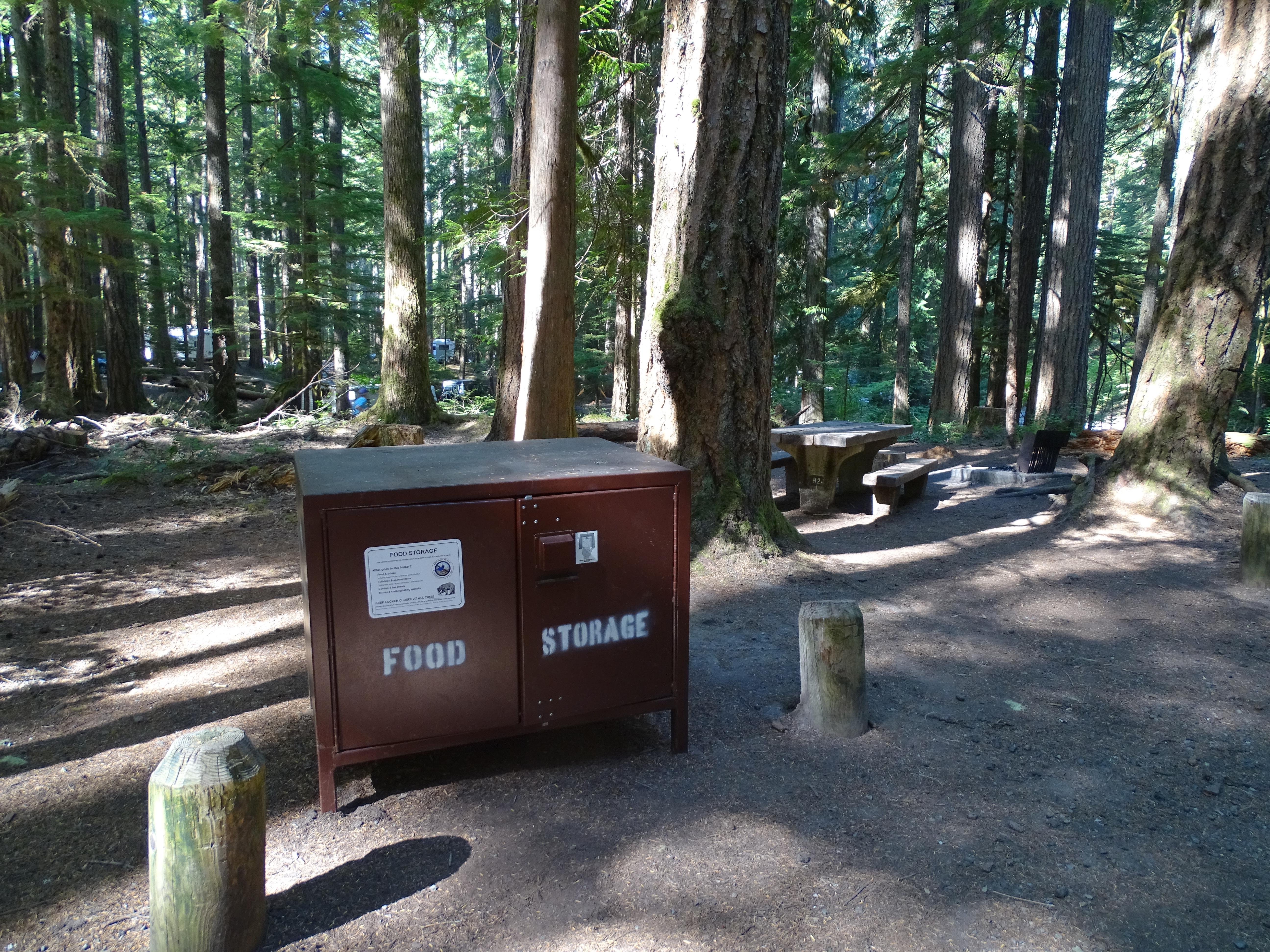 A small brown metal box labeled food storage.