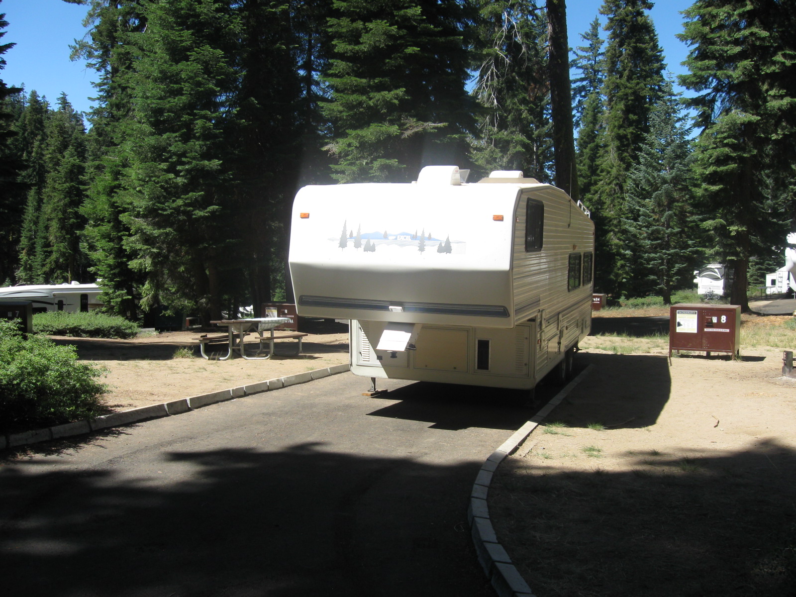 A recreational vehicle parked in a campsite