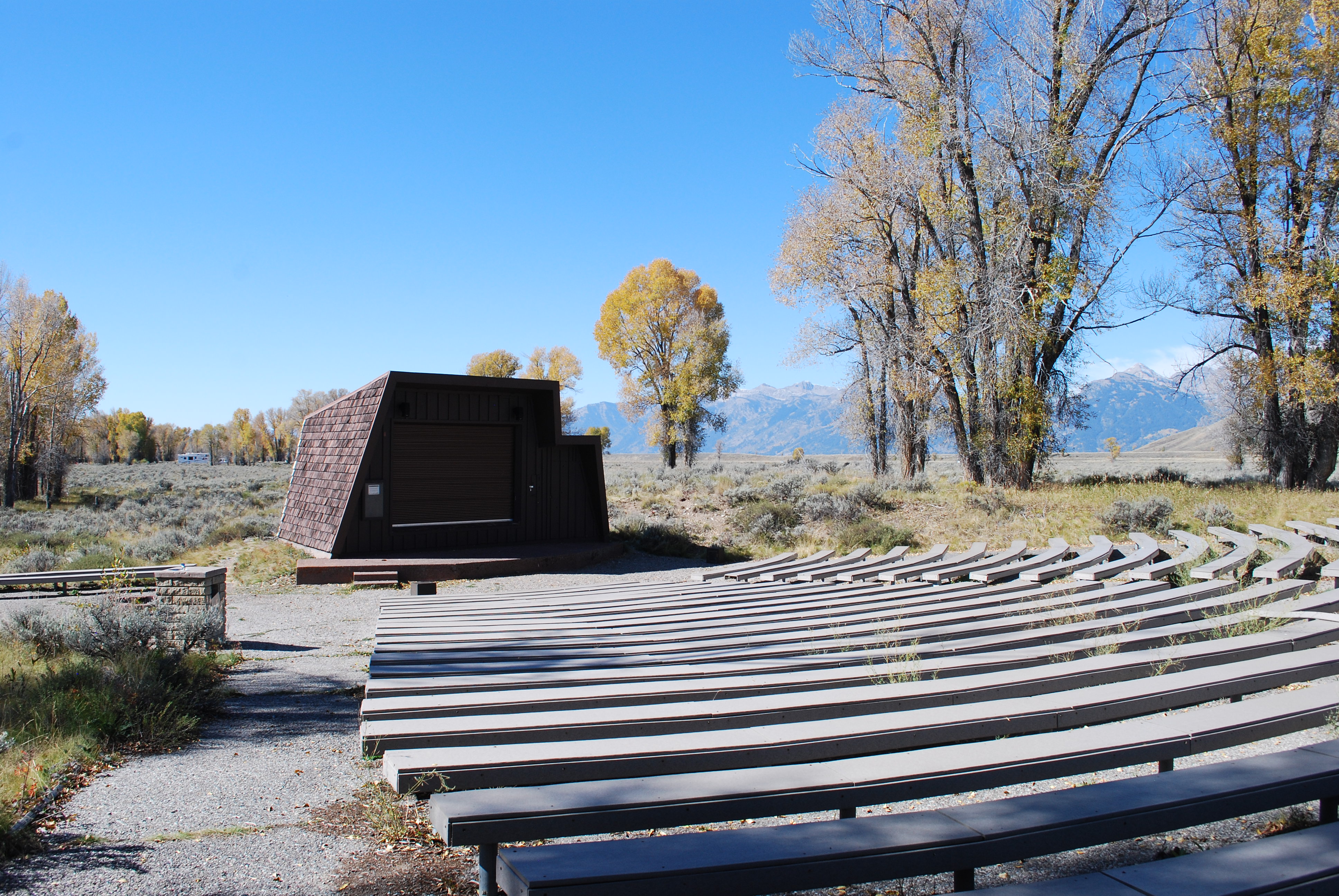 Gros Ventre Campground Amphitheater with bench seats and stage.