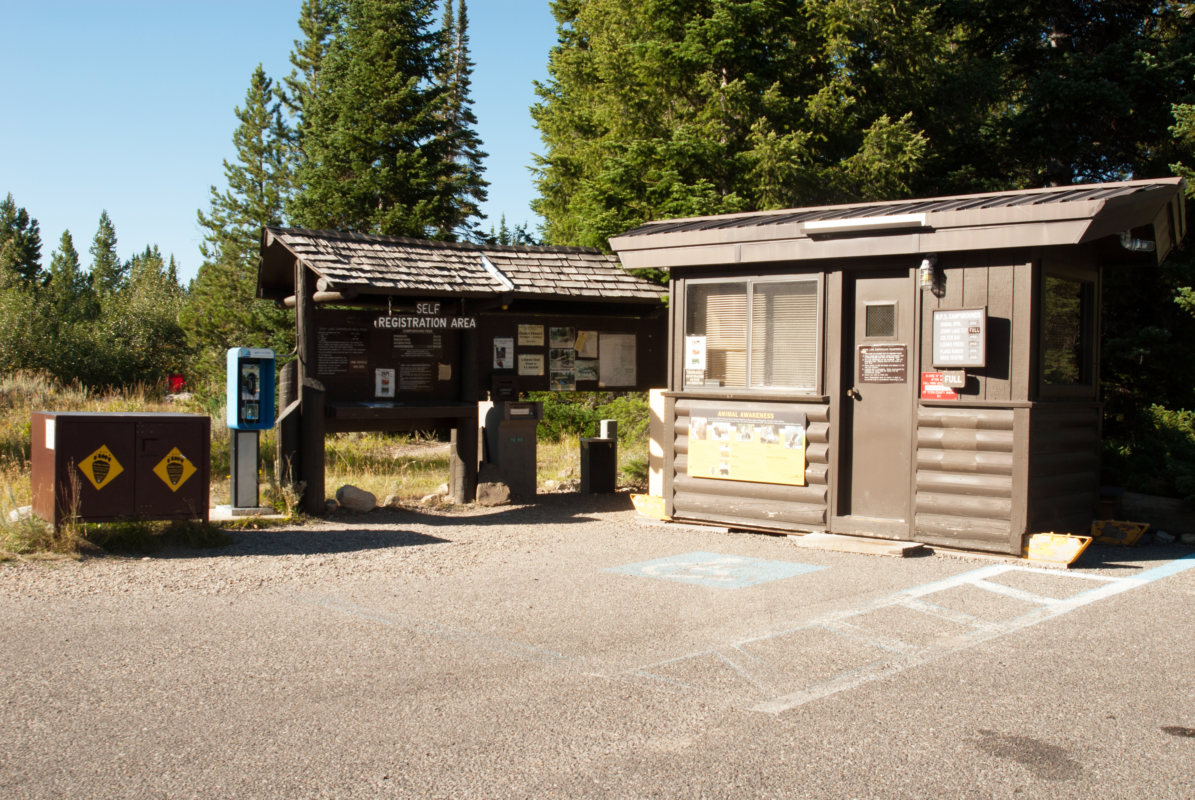 Jenny Lake Campground registration kiosk with campground information.