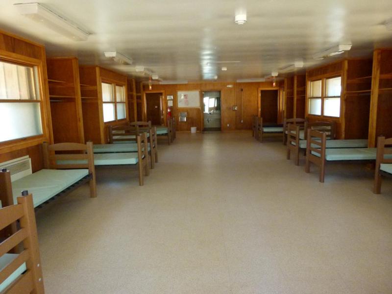 Sleeping cots inside a large room