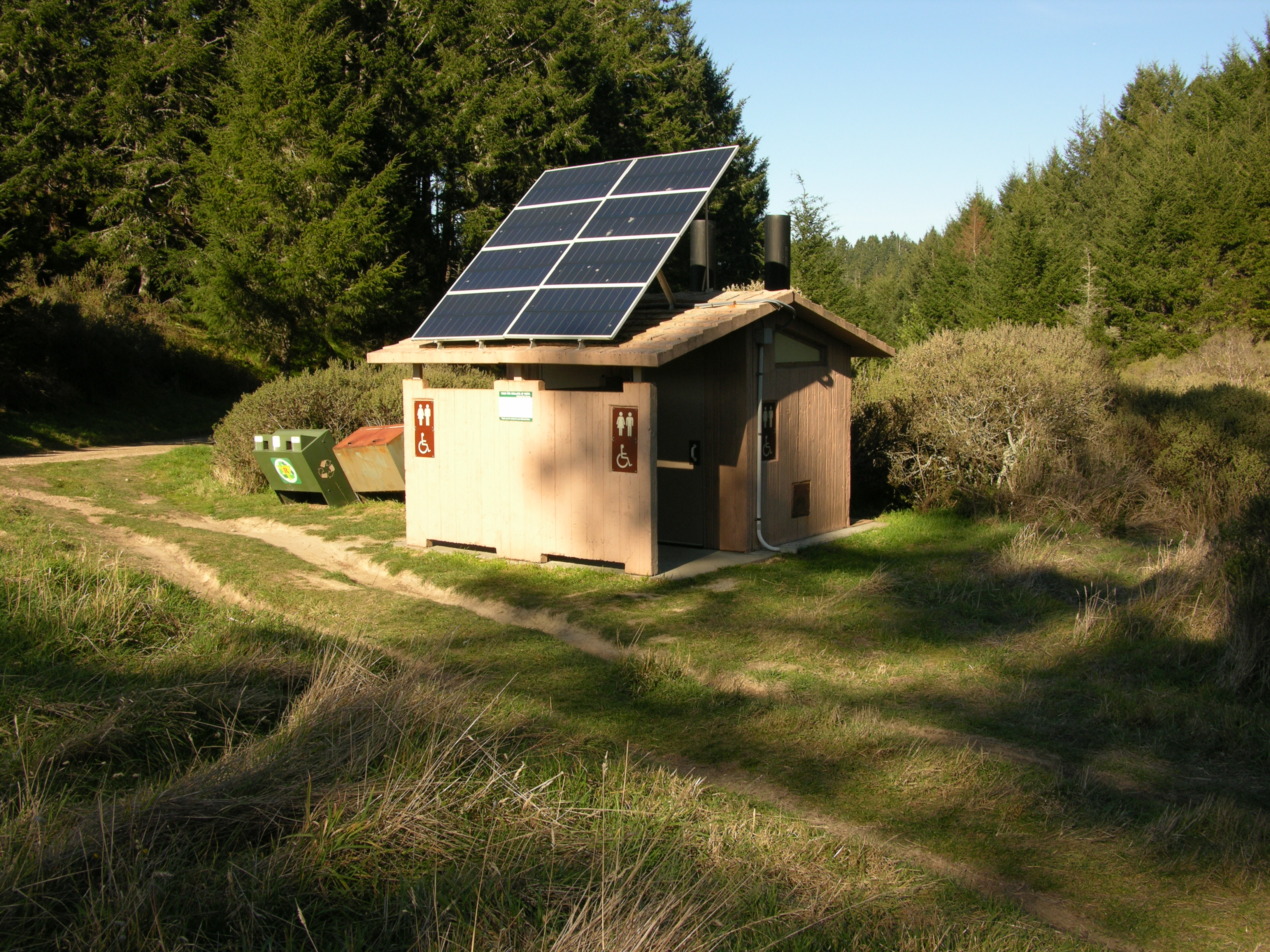 Sky Campground vault toilets with photovoltaic panels on the roof.