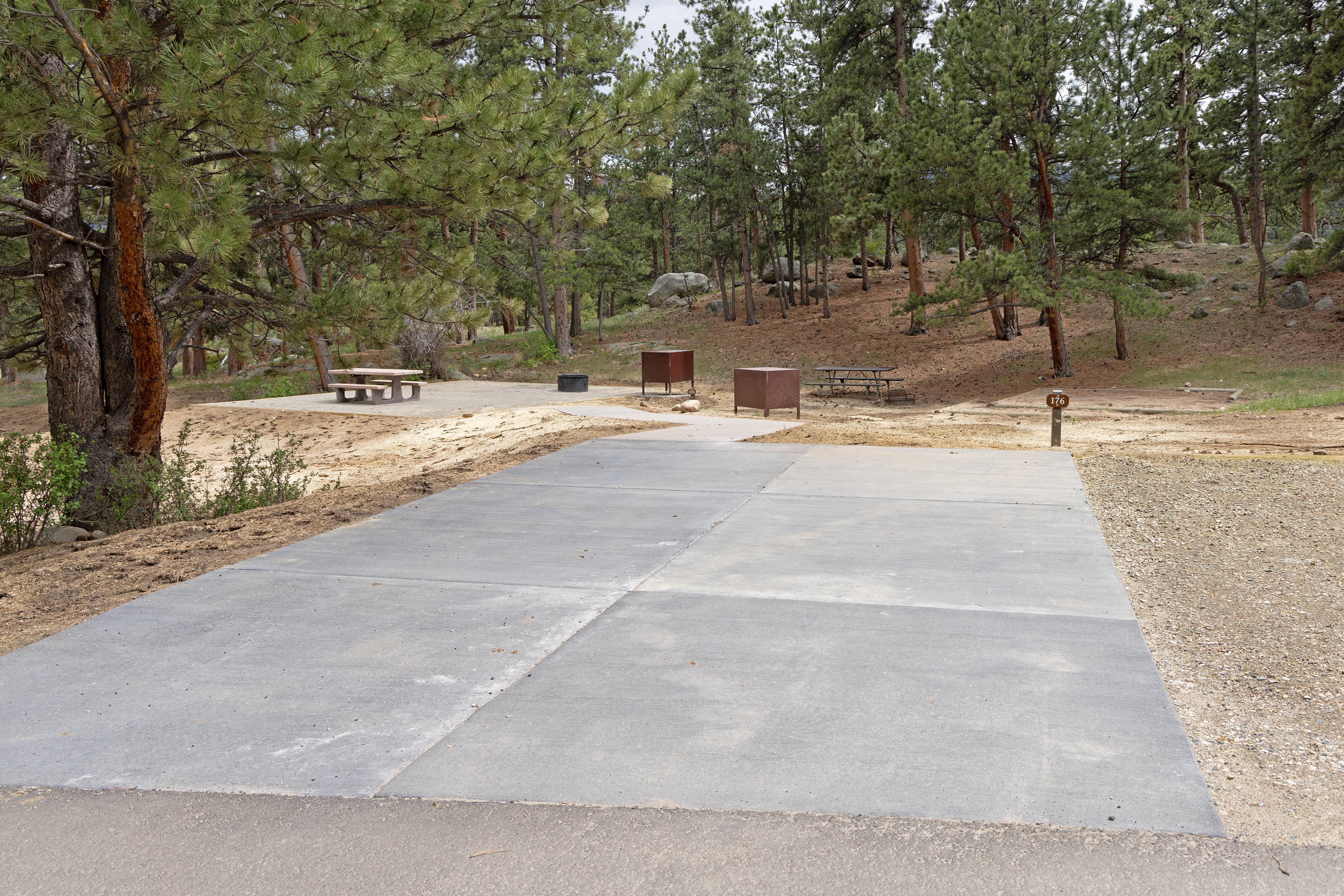 Example of a standard electric campsite with a concrete parking pad
