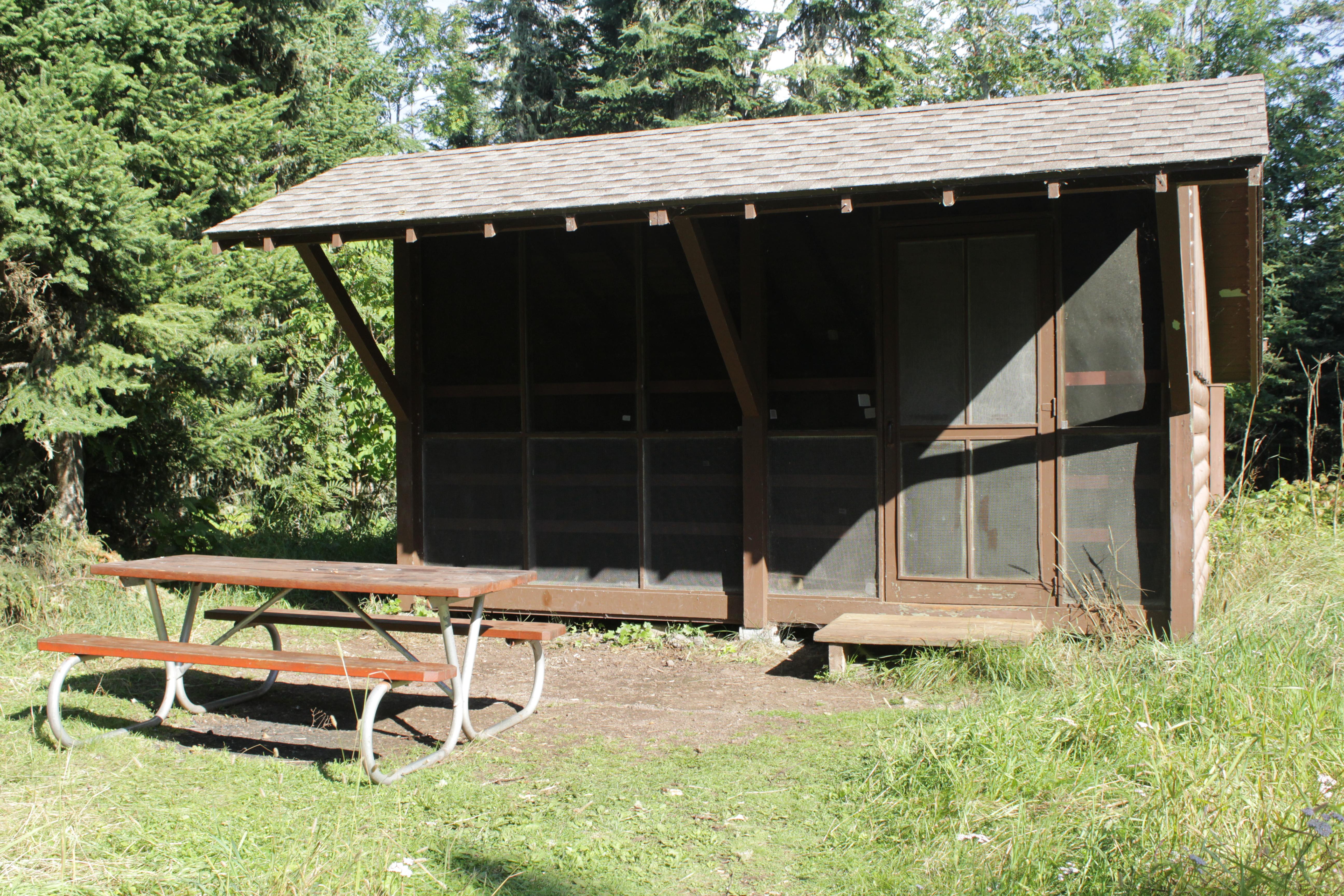 Campground Shelter with picnic table.