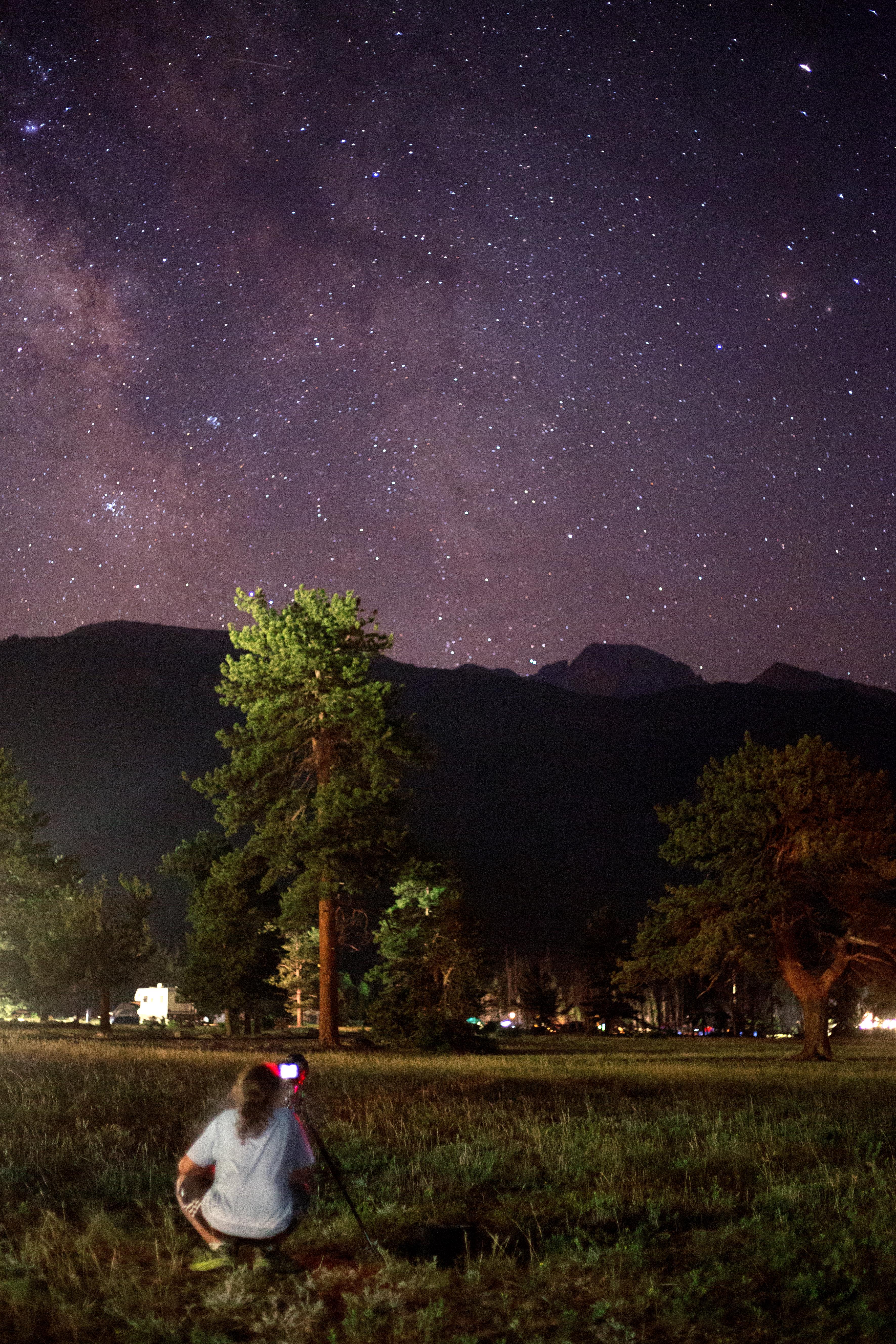 Stars shine in the night sky above Glacier Basin
