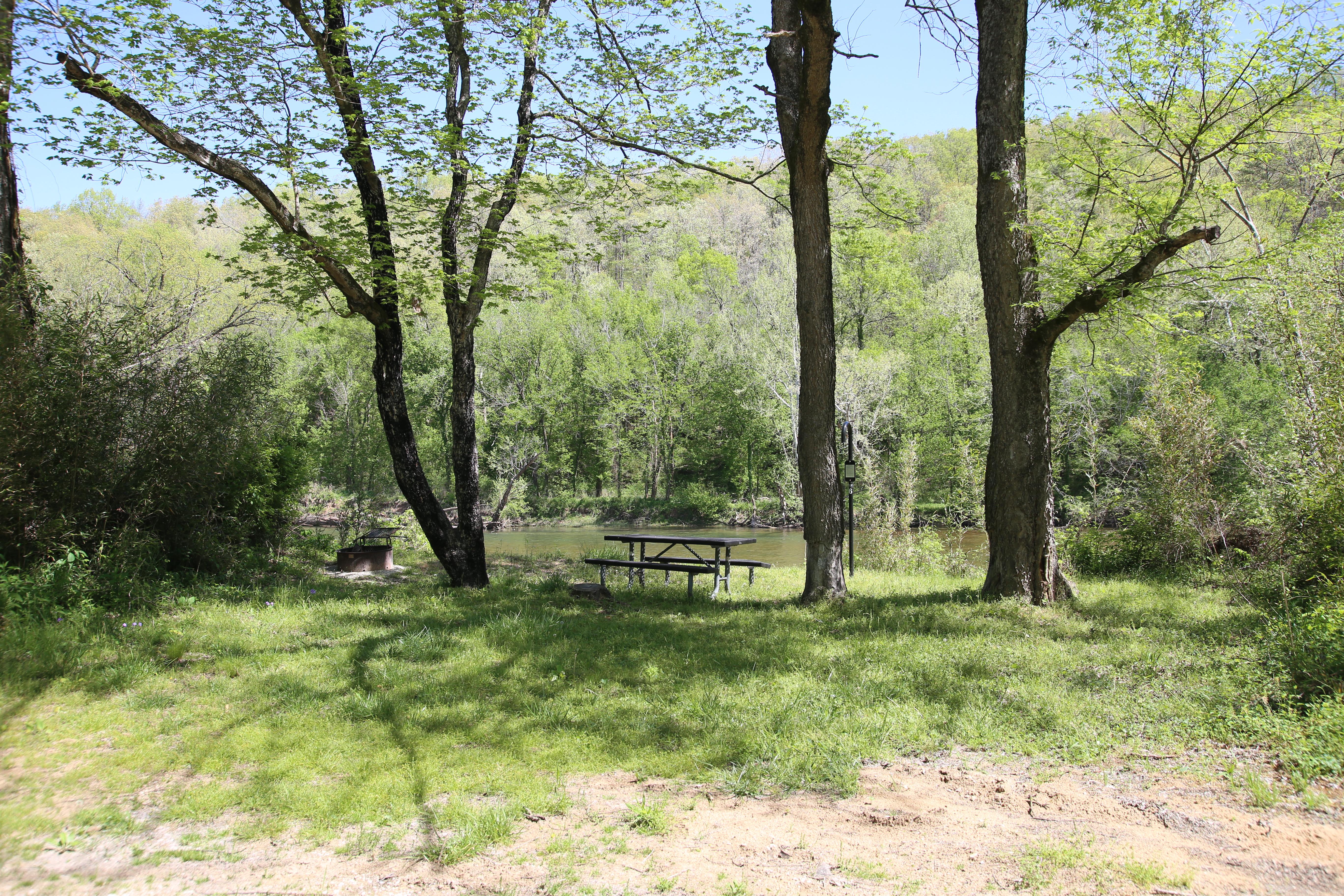 A picnic table right along the water's edge.