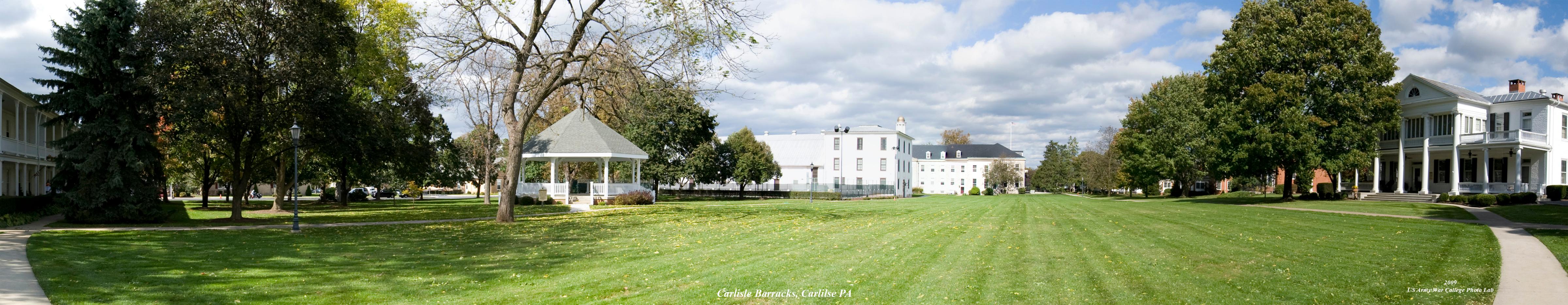Campus with large buildings, trees, and walkways