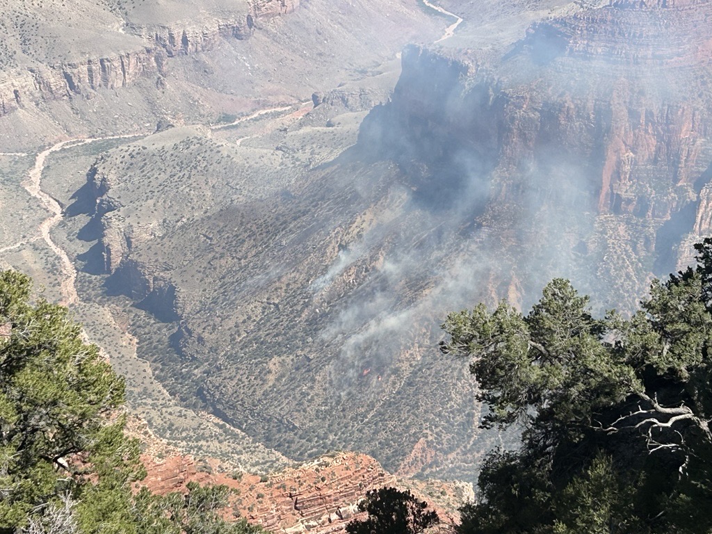 U.S. Wildland Fire Service responding to wildfire below North Rim